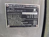 une pancarte apposée sur le côté d'une machine sur laquelle on peut lire « Same Deutschland Grinder »