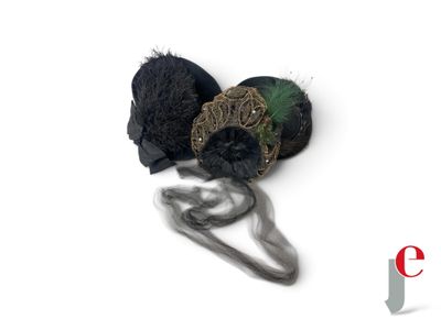 a black and green flower on top of a white background