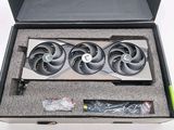 a box with three fan ' s in it on a white surface
