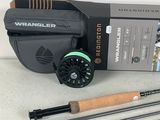 an image of a fly rod, reel, and other fly fishing equipment