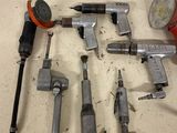 a lot of tools that are laying out on the floor