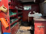 an image of a garage with a lot of tools