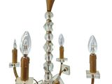 an image of a chandelier with three lights attached to it