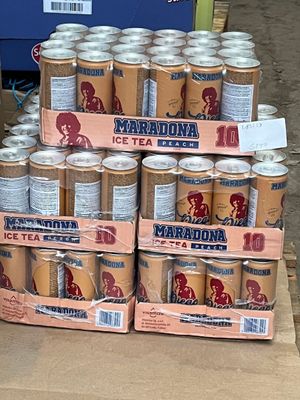 several cans of ice tea are stacked on top of each other