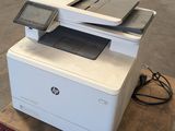 a printer that is sitting on top of a table