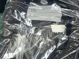 a plastic bag that has some kind of electronic device inside of it