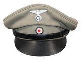 an image of a military hat with a red button on it