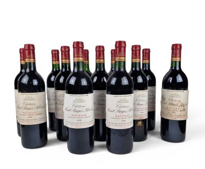 six bottles of red wine lined up in a row on a white surface