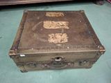 an old suitcase sitting on the floor in a room