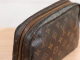 a close up of a louis vuitton toilet bag