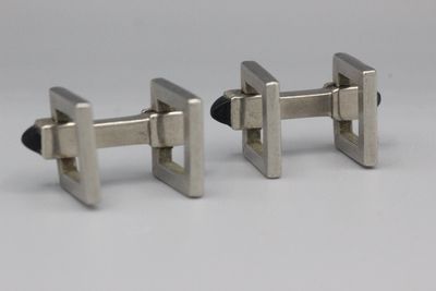 Paire de boutons de manchettes Etriers