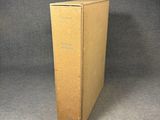 a cardboard box that is sitting on the floor