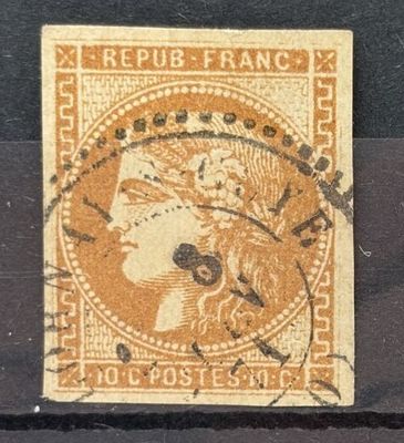 un vieux timbre sur lequel figure l'image d'une femme
