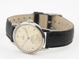 an image of a wrist watch with a black leather strap