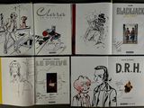 a lot of drawings on the pages of a book