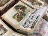 a lot of old books that are on a table