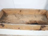 a wooden box that has been turned into a bed