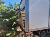 a truck that is parked on the side of the road