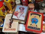 many tins that are sitting on a table