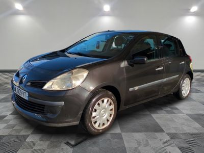 a picture of a grey car parked in a garage