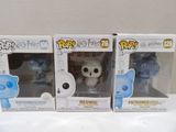 two boxes of funky toys are sitting on a white surface