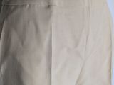 a close up of a person ' s pants with a shirt on