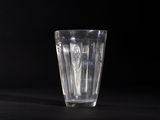 the glass is empty on the table on a black background