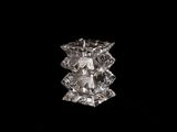 an image of a crystal candle holder on a black background