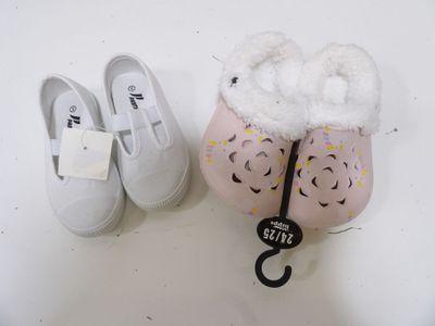 a pair of shoes and a pair of slippers on a table