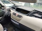 a picture of a car dashboard with a steering wheel and a dash board