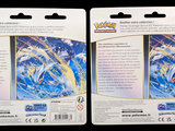 two packs of pokemon trading cards on a black background