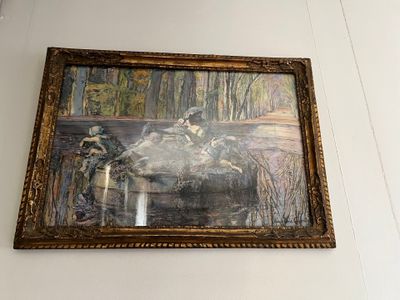 une image d'un tableau accroché au mur d'une pièce