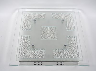 clear glass plate with a square design on it