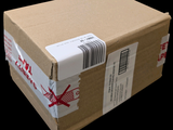 a cardboard box with a barcode on it