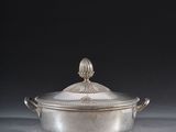 an antique silverplated casserole with a domed lid