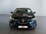 the front view of a black car parked in a showroom