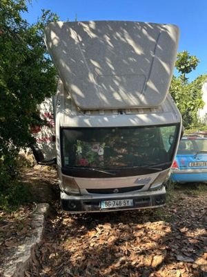 a truck that is parked on the side of the road