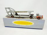 a toy truck with a crane on top of it