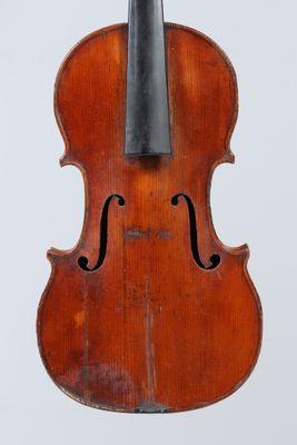 an old violin with a bow on a white background