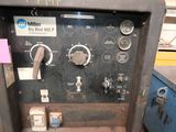 a machine that is sitting on the floor in the room