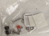a bag of screws and nuts on a table