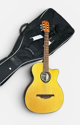 a yellow guitar and a black case on a white background