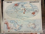 an old map of the british and canadian empire on a wooden table