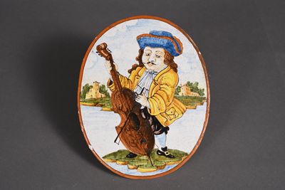 a picture of a picture of a man playing a cello
