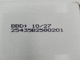 a close up of a piece of paper with a black and white image on it