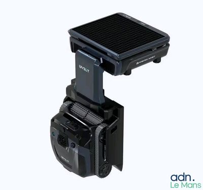 a small solar powered camera attached to a tripod