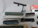 many different types of toy trains on display on the table