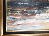 a painting on the wall of a room with a picture of the ocean