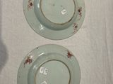 two plates that are sitting on a table