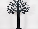an image of a metal sculpture of a tree with birds on it